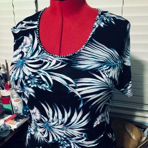 Cute blouse with beaded neckline